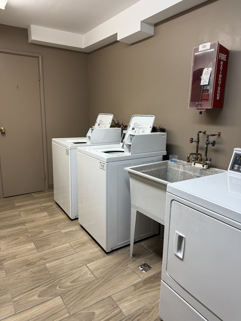 19380 Wolf Road, Unit 5 Mokena, IL 60448 - Photo 19 of 20 a utility room with dryer and washer