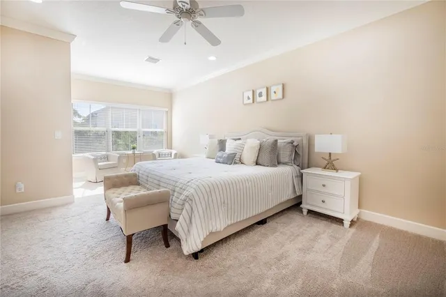 a bathroom with a granite countertop sink a large mirror and a shower