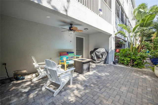 a kitchen with stainless steel appliances a refrigerator and a stove top oven