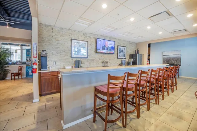a view of a backyard with sitting area