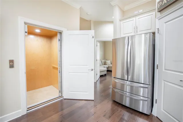a view of a dining room and livingroom with furniture