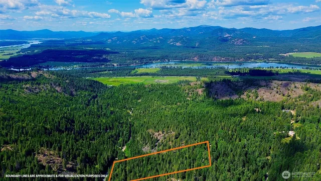 a view of lake with mountain