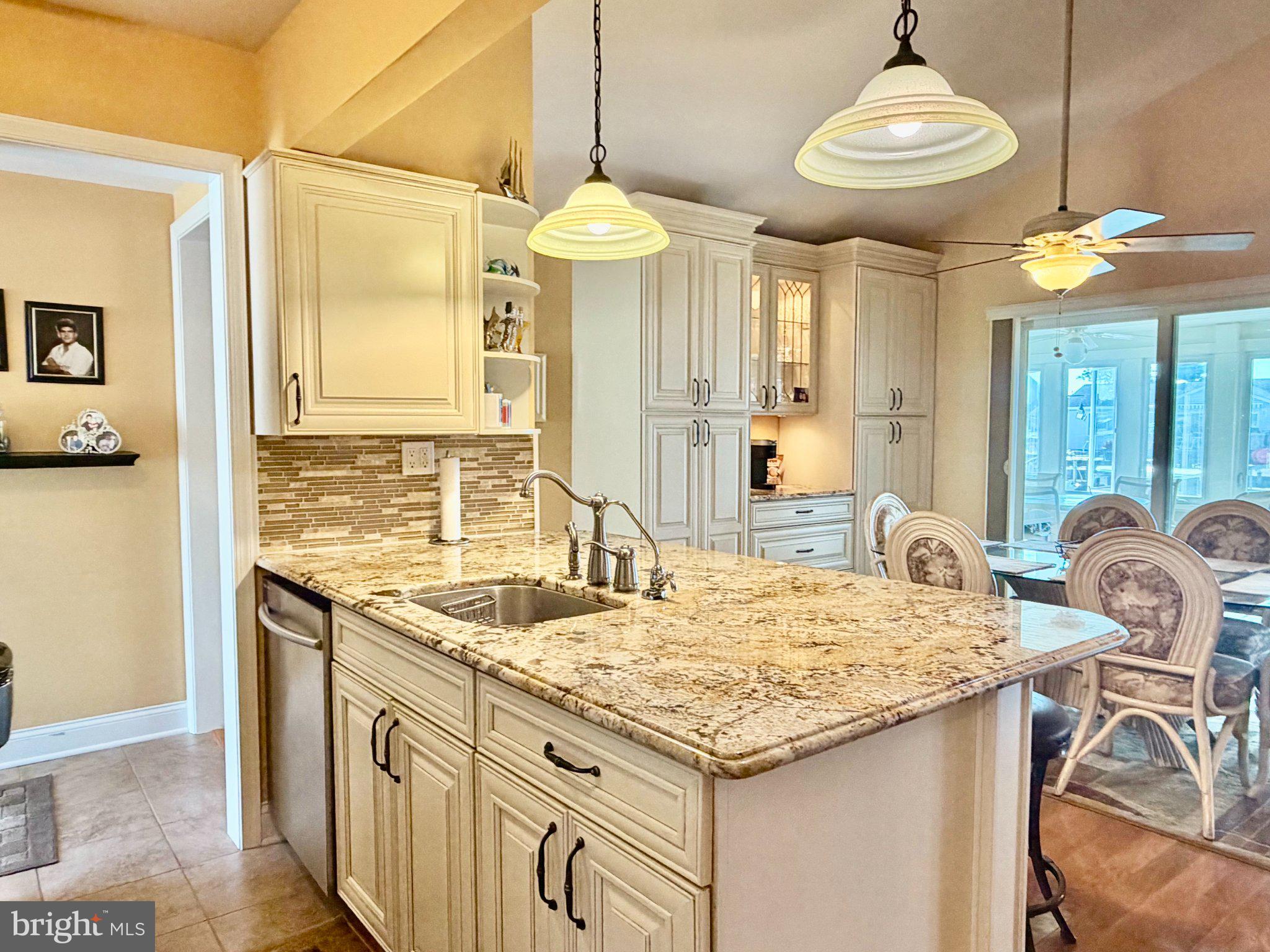 211 William Cook Boulevard Manahawkin, NJ 08050 - Photo 9 of 71 Charming kitchen with elegant finishes.
