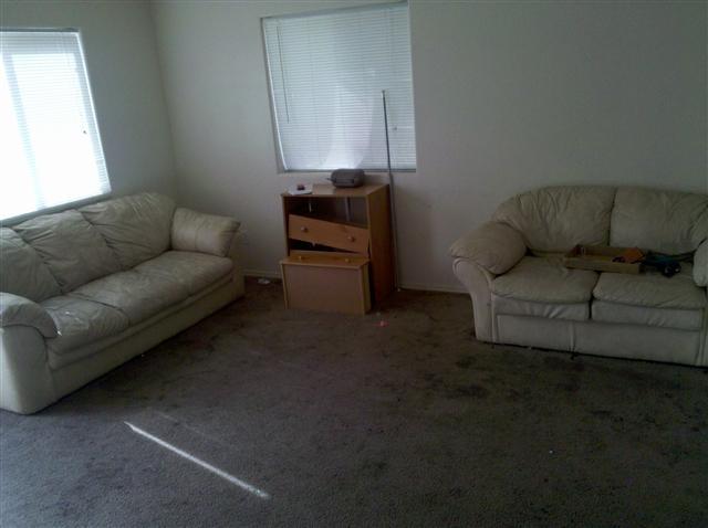 2602 West Ocotillo Road Phoenix, AZ 85017 - Photo 8 of 12 a living room with furniture and a couch
