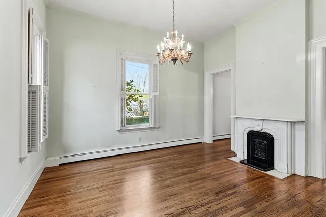 a bathroom with a sink and a refrigerator