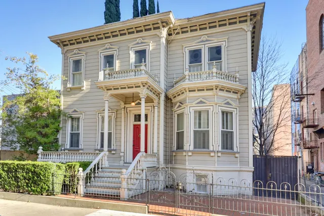 a view of a garden filled with lots of potted plants