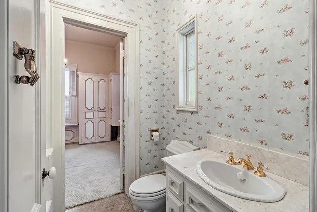 a view of hallway with wooden floor