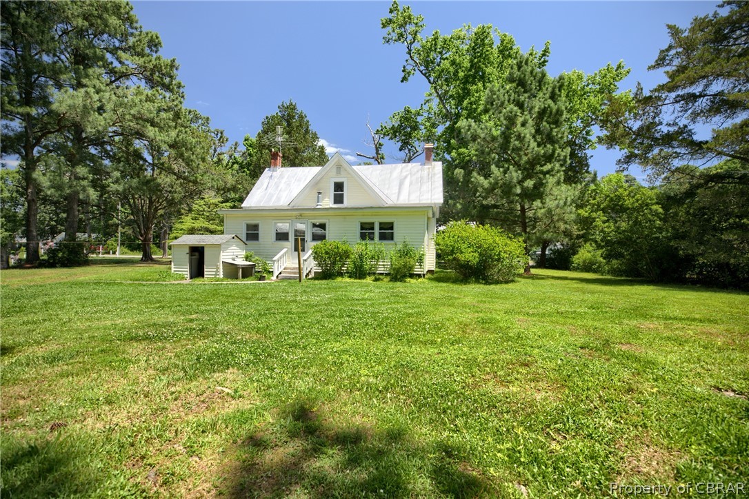 2442 Old Ferry Road Hudgins, VA 23076 - Photo 10 of 33 View of yard featuring an outdoor structure