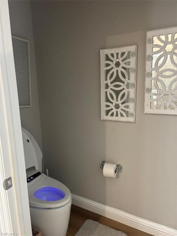 1599 Marton Court Naples, FL 34113 - Photo 15 of 25 Separate toilet in master suite