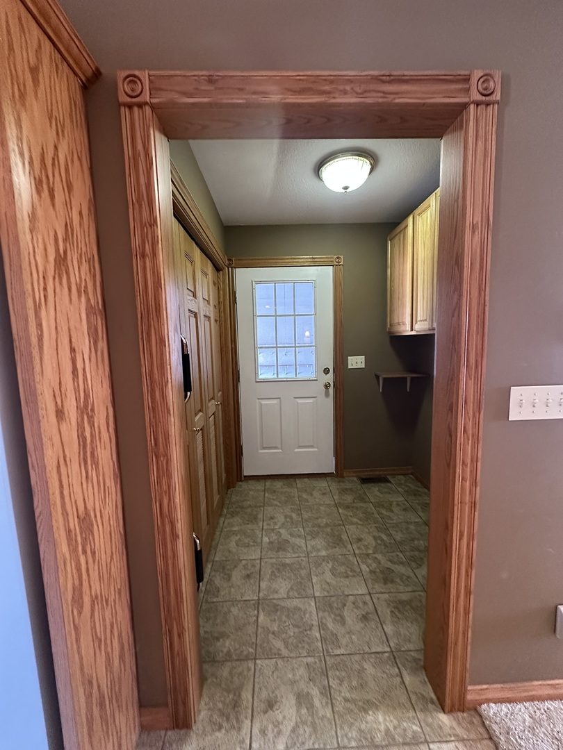 1005 North Fox Run Villa Grove, IL 61956 - Photo 38 of 45 a view of hallway with windows