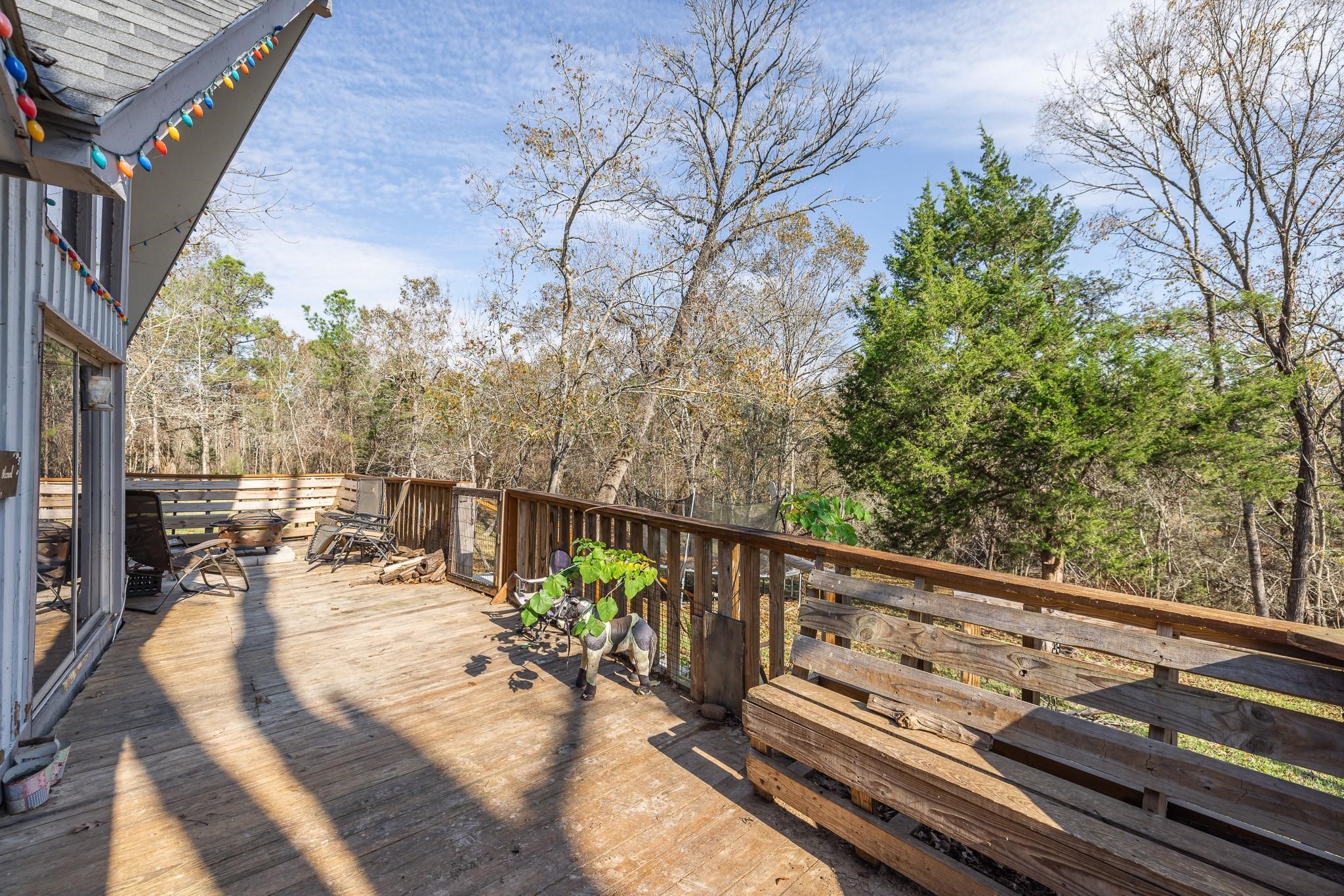 761 North Forest Cove Loop Coldspring, TX 77331 - Photo 28 of 33 a view of a balcony with chairs