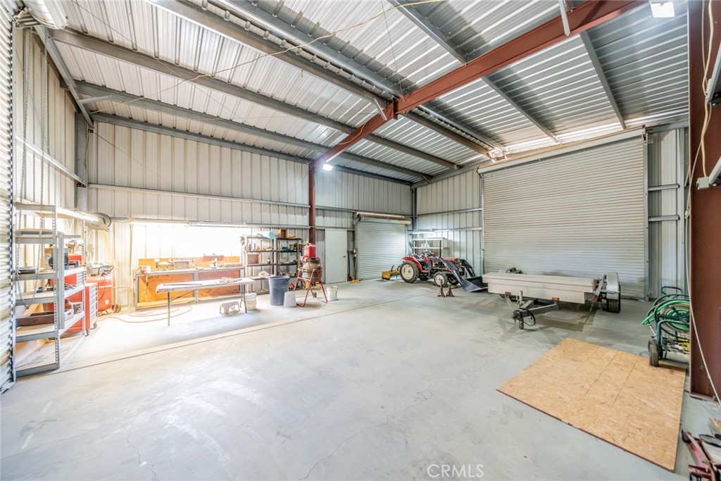 13880 Paramount Road Phelan, CA 92371 - Photo 41 of 54 a view of a garage with furniture