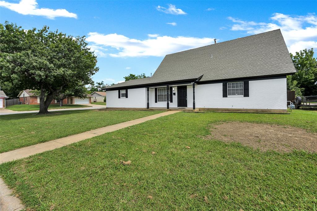 3651 Rough Creek Road Forest Hill, TX 76140 - Photo 1 of 1 View of front facade featuring a front yard and roof with shingles