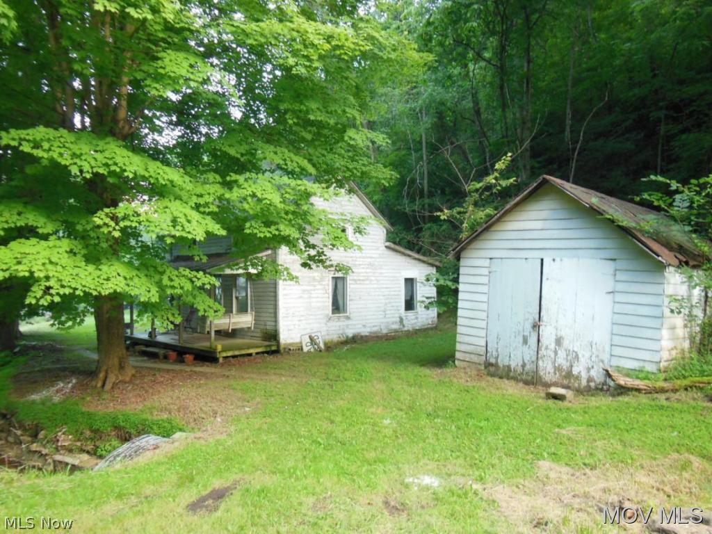 1992 Shields Hill Road Cairo, WV 26337 - Photo 2 of 10 Side view shows the detached garage (used for storage).