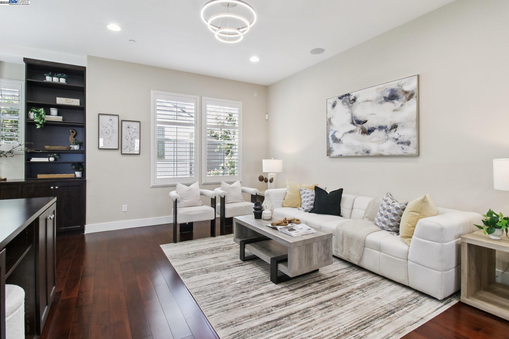 38262 Luma Terrace Newark, CA 94560 - Photo 1 of 1 a living room with furniture and wooden floor