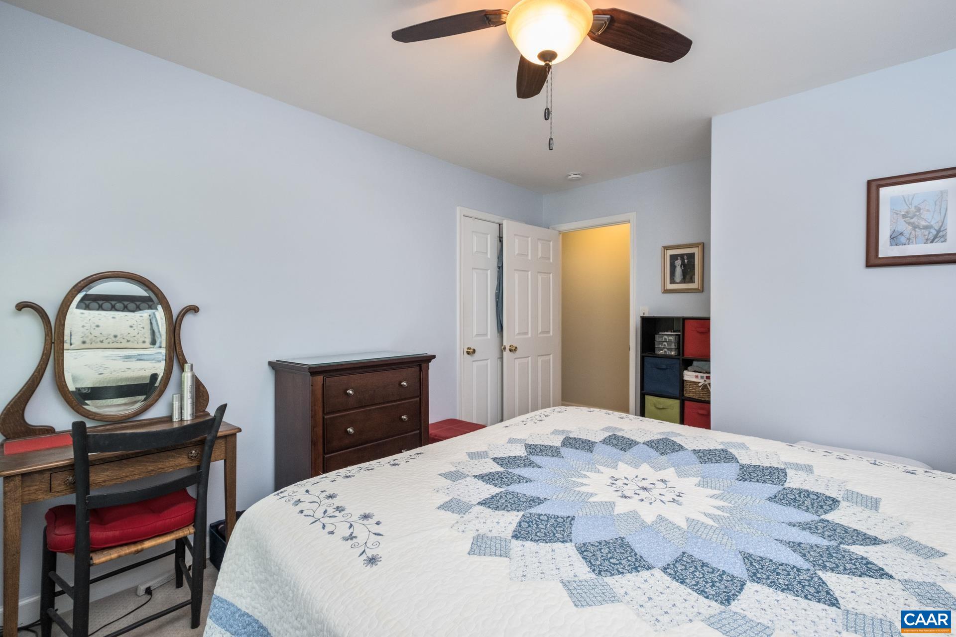 162 Rolling Hills Road Ruckersville, VA 22968 - Photo 28 of 48 a bedroom with a bed and a dresser