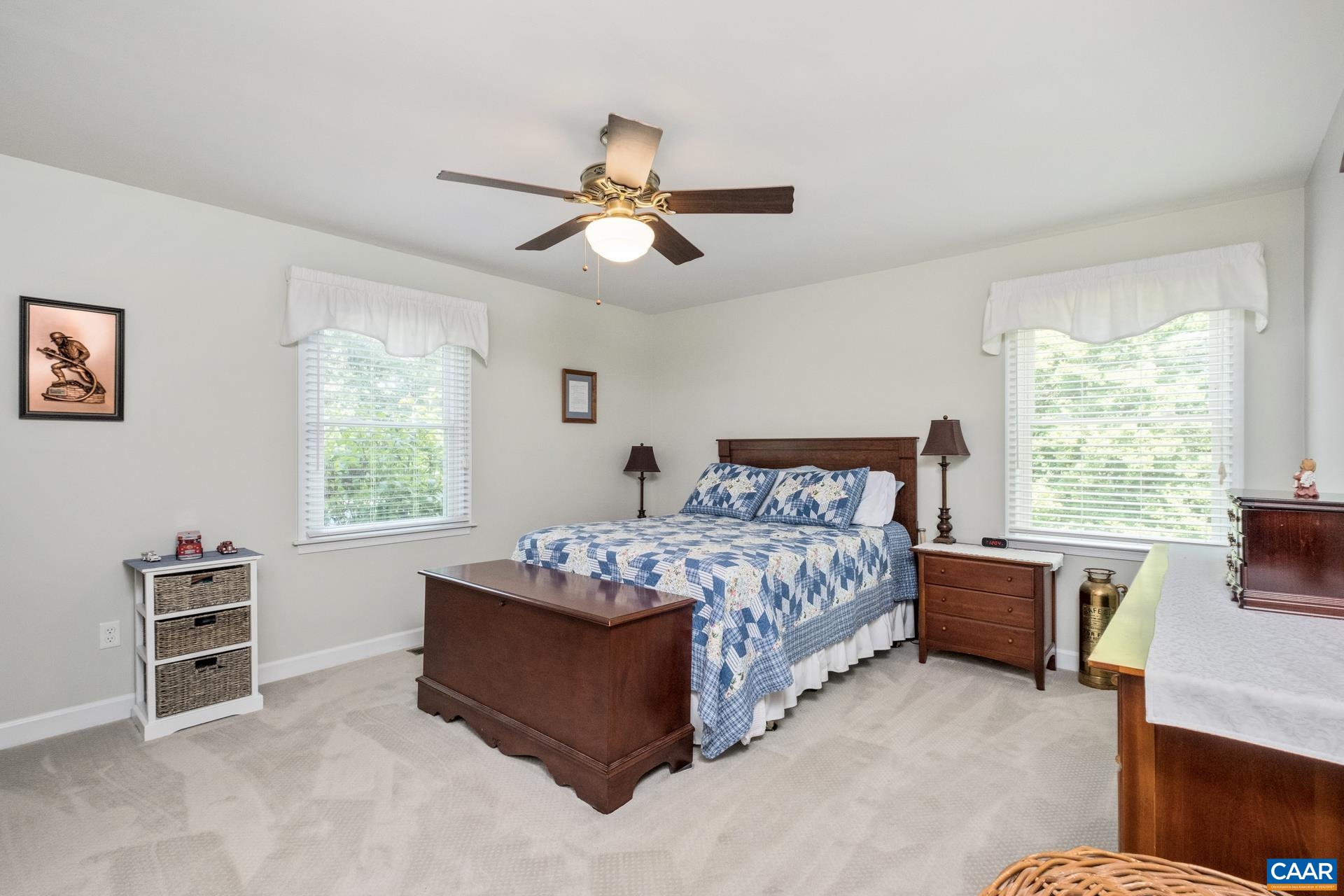 162 Rolling Hills Road Ruckersville, VA 22968 - Photo 30 of 48 a bedroom with a bed and a window