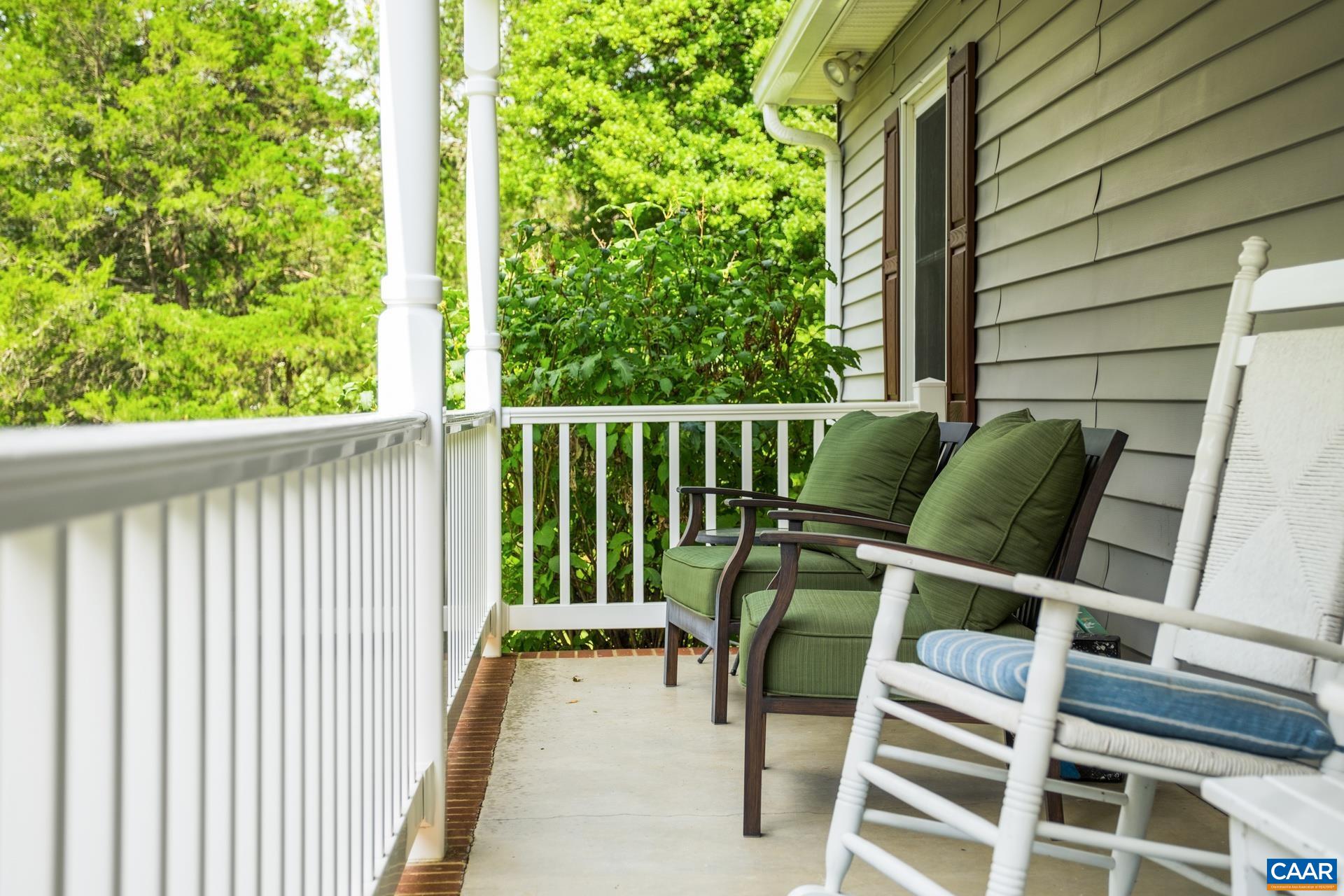 162 Rolling Hills Road Ruckersville, VA 22968 - Photo 3 of 48 a balcony with furniture and a potted plant