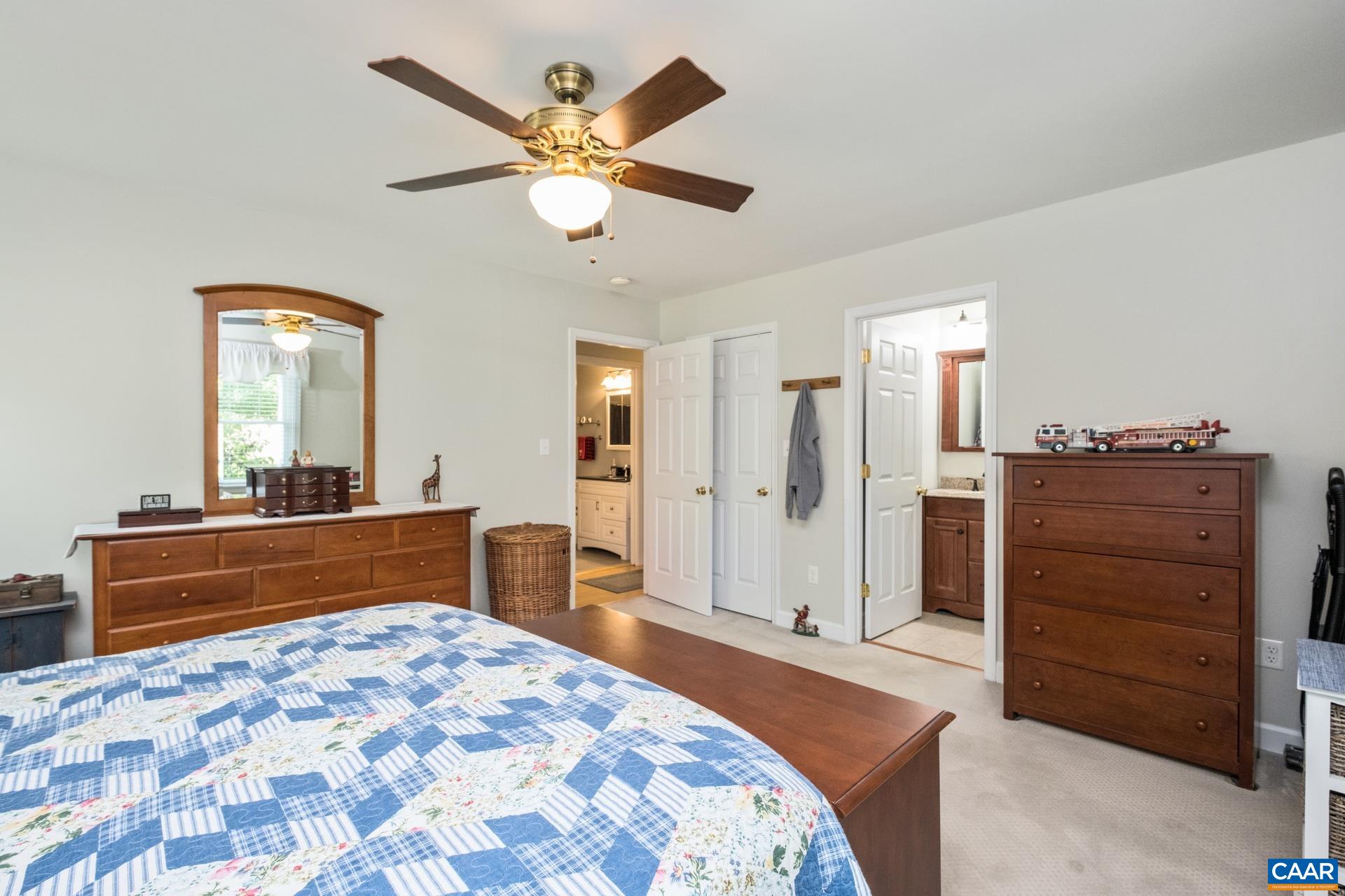 162 Rolling Hills Road Ruckersville, VA 22968 - Photo 31 of 48 a bedroom with a bed and a dresser