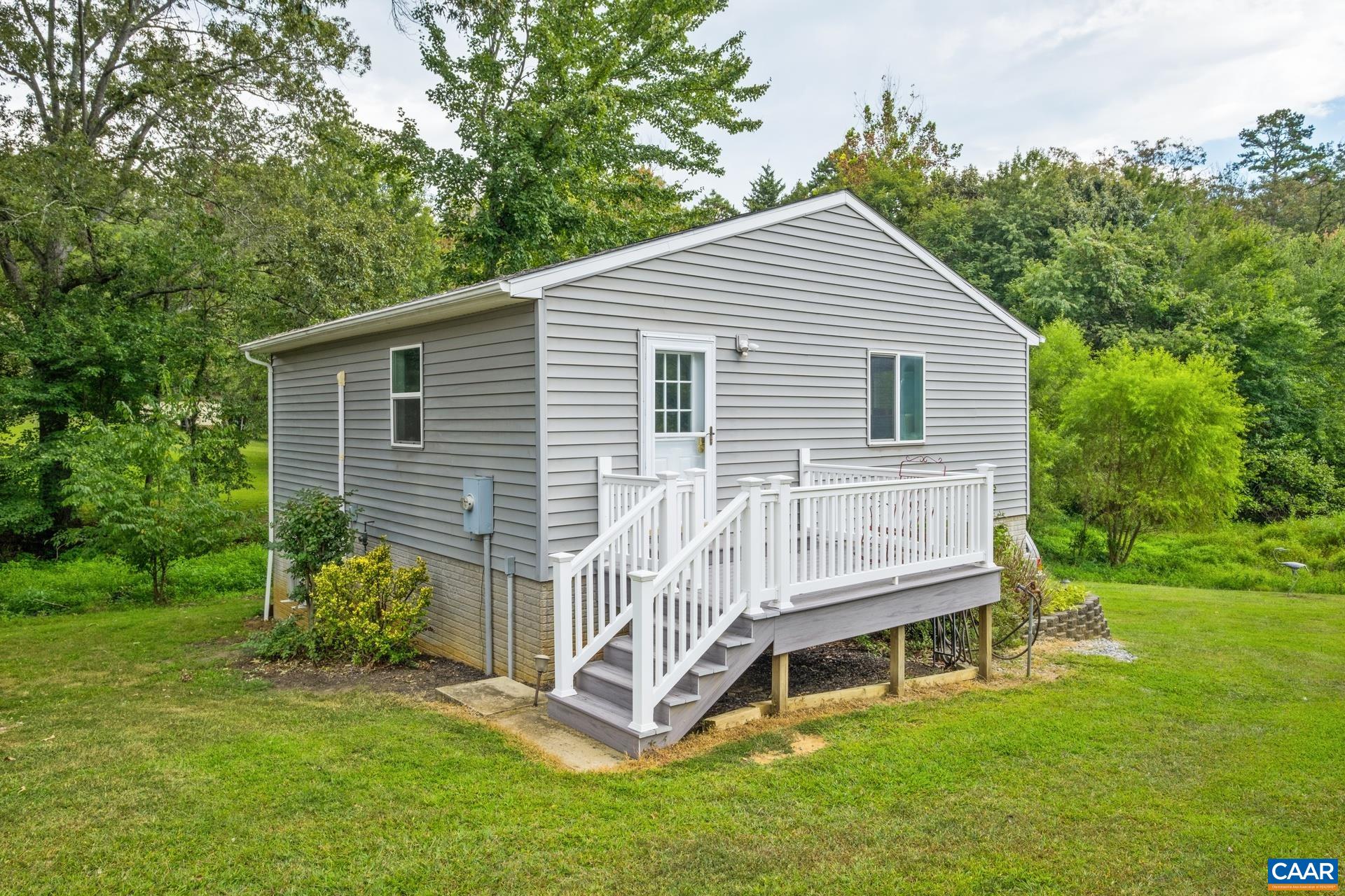 162 Rolling Hills Road Ruckersville, VA 22968 - Photo 43 of 48 a front view of a house with a yard
