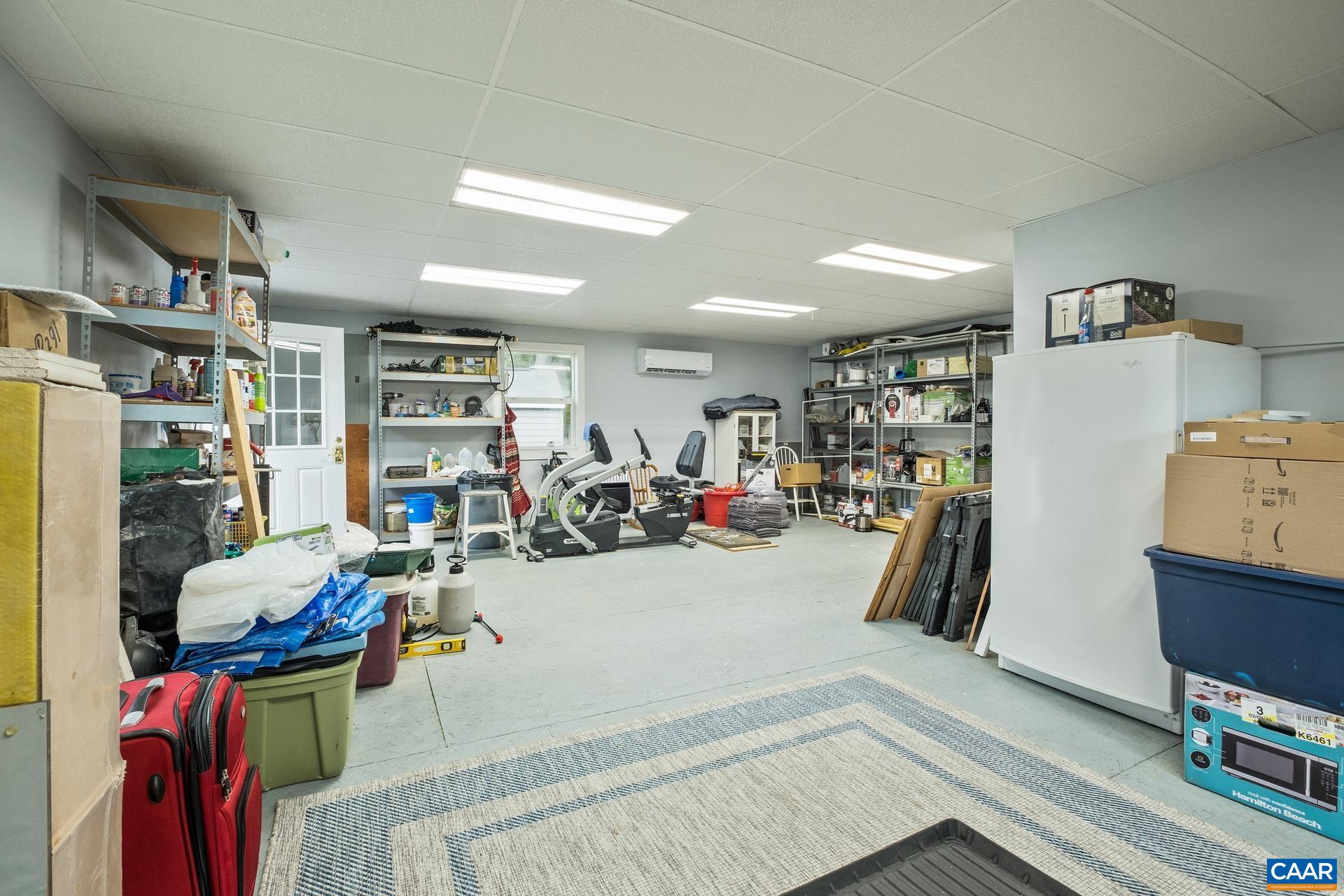 162 Rolling Hills Road Ruckersville, VA 22968 - Photo 46 of 48 a view of a room with gym equipment