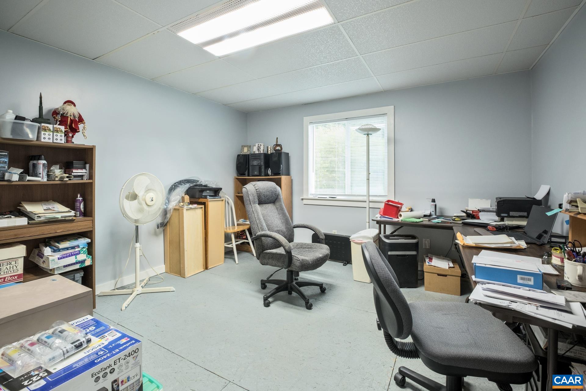 162 Rolling Hills Road Ruckersville, VA 22968 - Photo 47 of 48 a view of a workspace with furniture and a window
