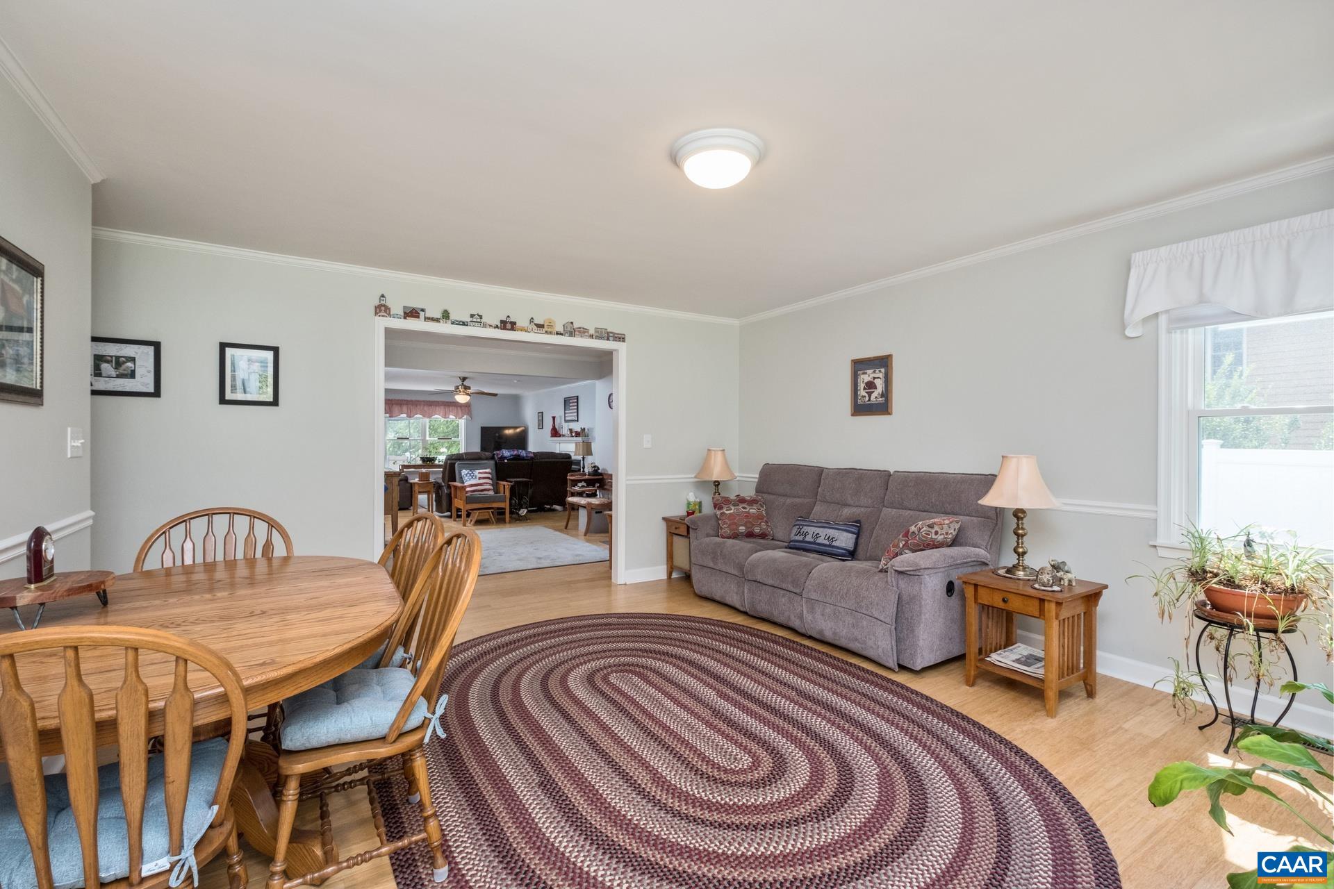 162 Rolling Hills Road Ruckersville, VA 22968 - Photo 9 of 48 a living room with furniture and a table