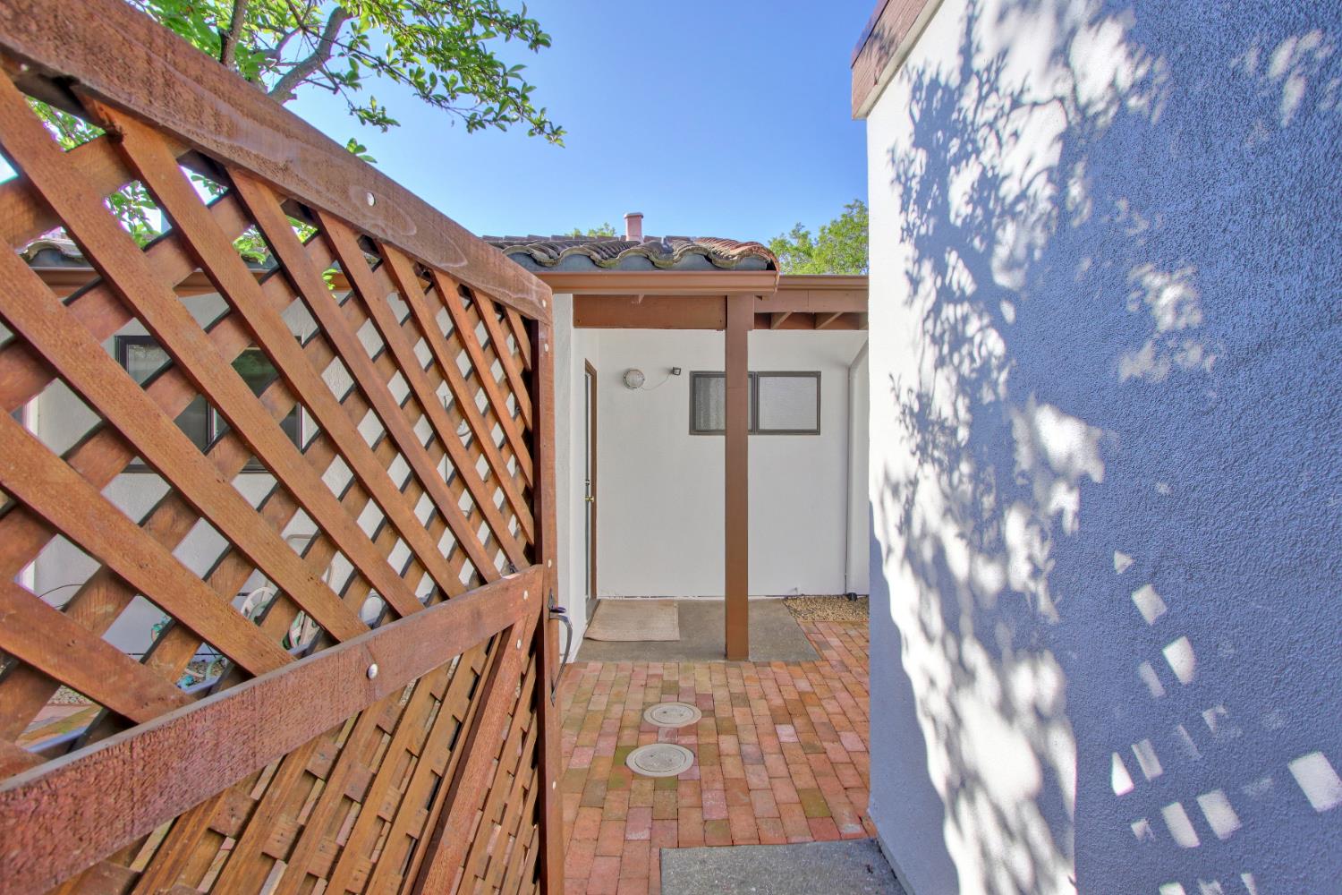 2526 Overhill Lane Davis, CA 95616 - Photo 2 of 60 a view of balcony with wooden floor and fence