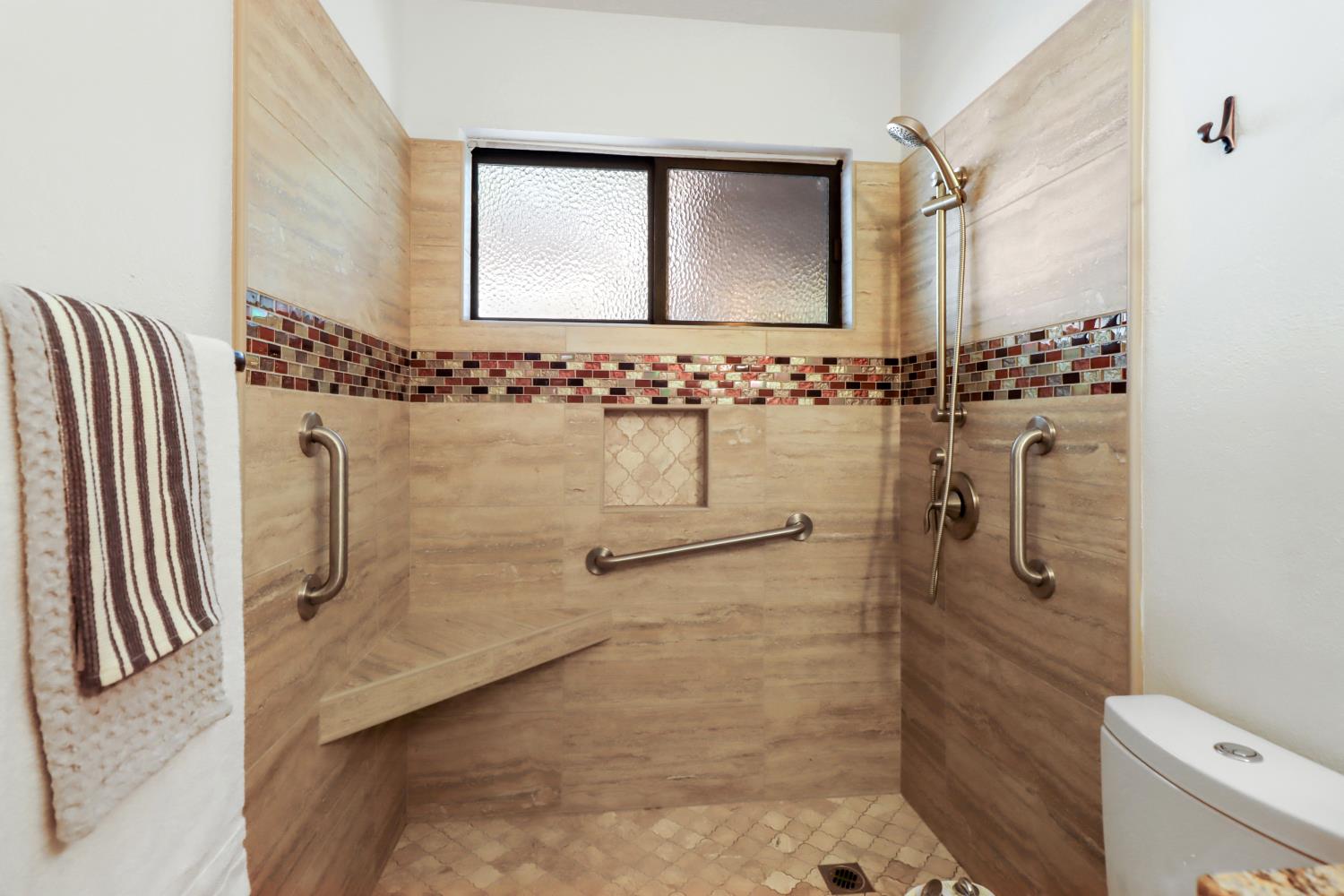 2526 Overhill Lane Davis, CA 95616 - Photo 31 of 60 a bathroom with a granite countertop sink a mirror and shower