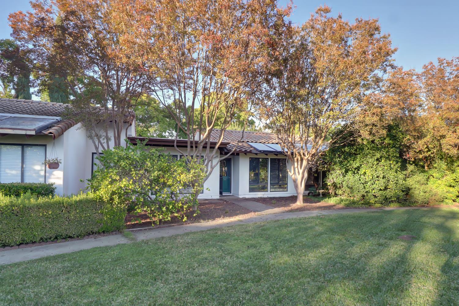 2526 Overhill Lane Davis, CA 95616 - Photo 37 of 60 a front view of a house with a garden