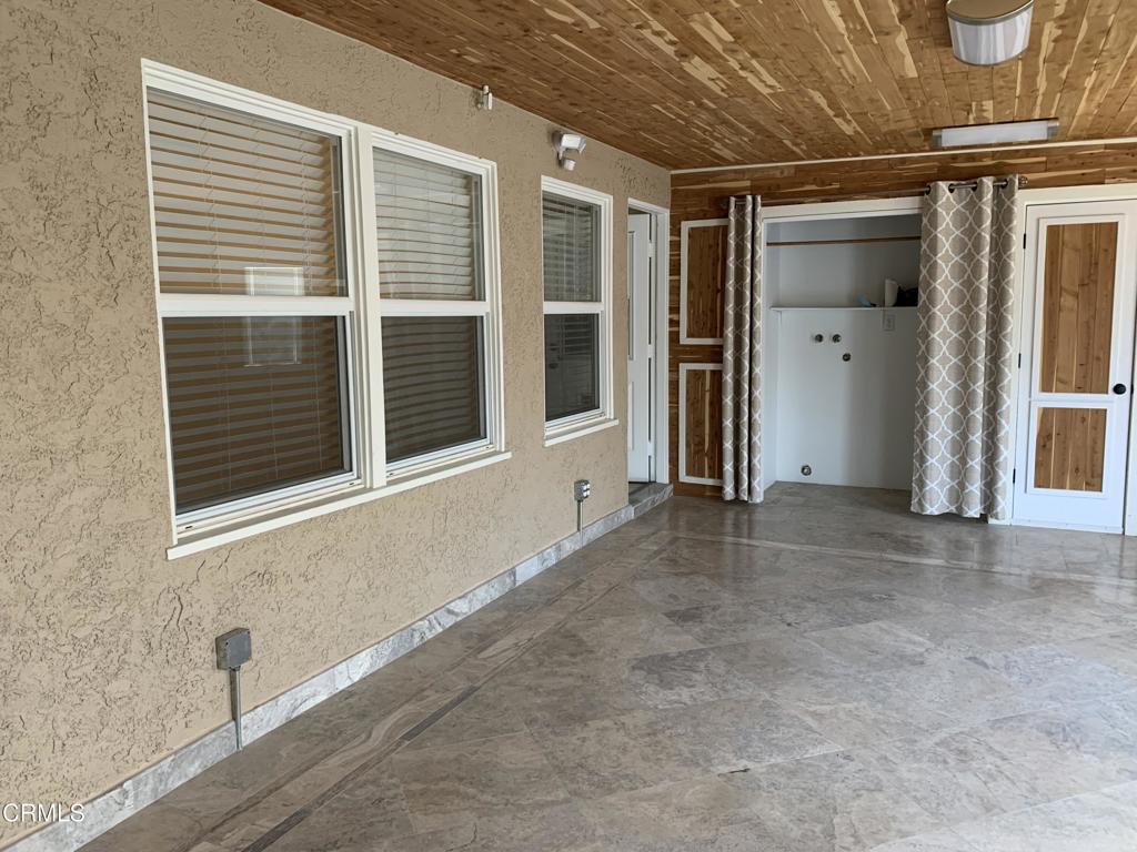 938 Ford Street Corona, CA 92879 - Photo 21 of 36 a view of an empty room with a window