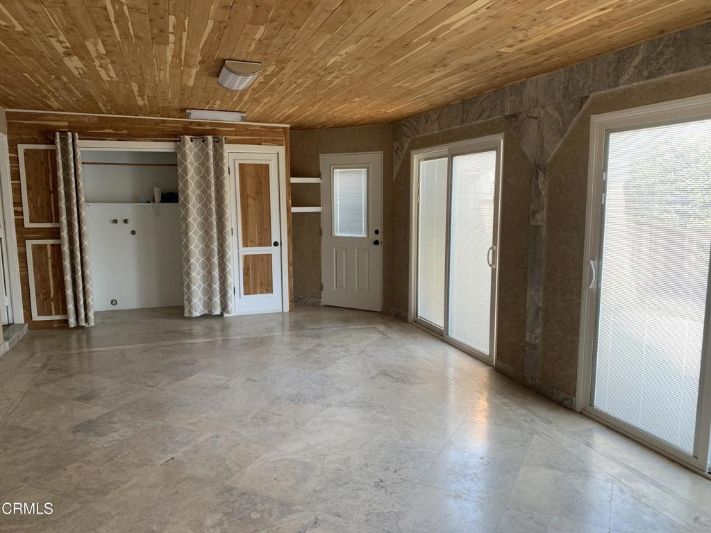 938 Ford Street Corona, CA 92879 - Photo 22 of 36 a view of empty room with windows