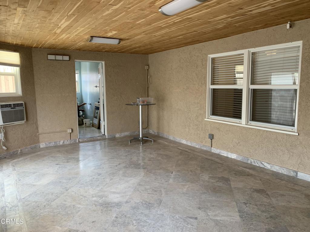 938 Ford Street Corona, CA 92879 - Photo 23 of 36 a view of an empty room with a window