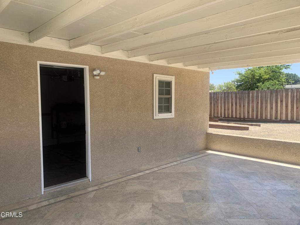 938 Ford Street Corona, CA 92879 - Photo 32 of 36 a view of backyard with wooden fence
