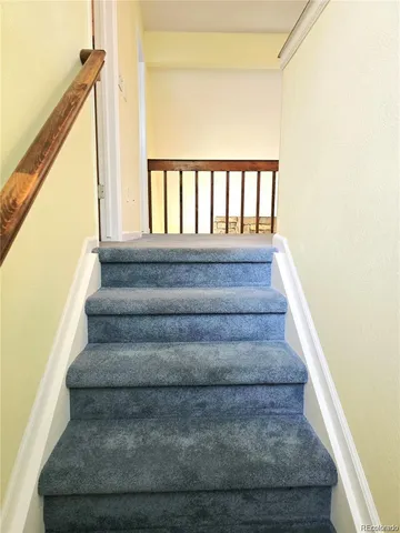 a view of a big room with wooden floor