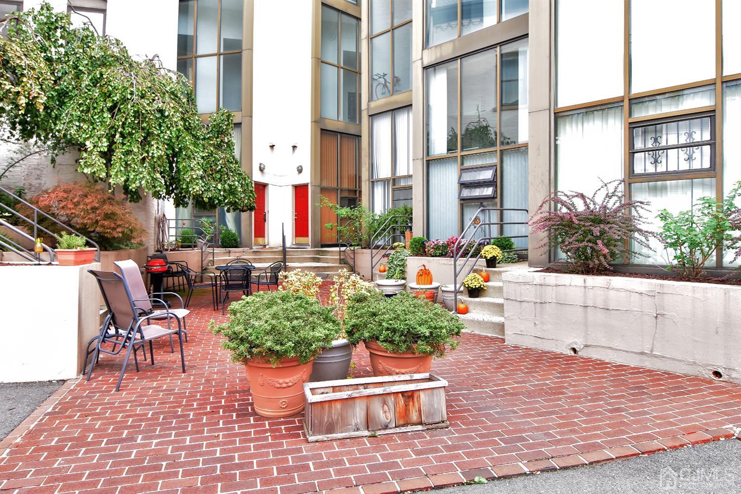 222 Clinton Street, Unit 23 Hoboken, NJ 07030 - Photo 10 of 12 a view of outdoor space yard and patio