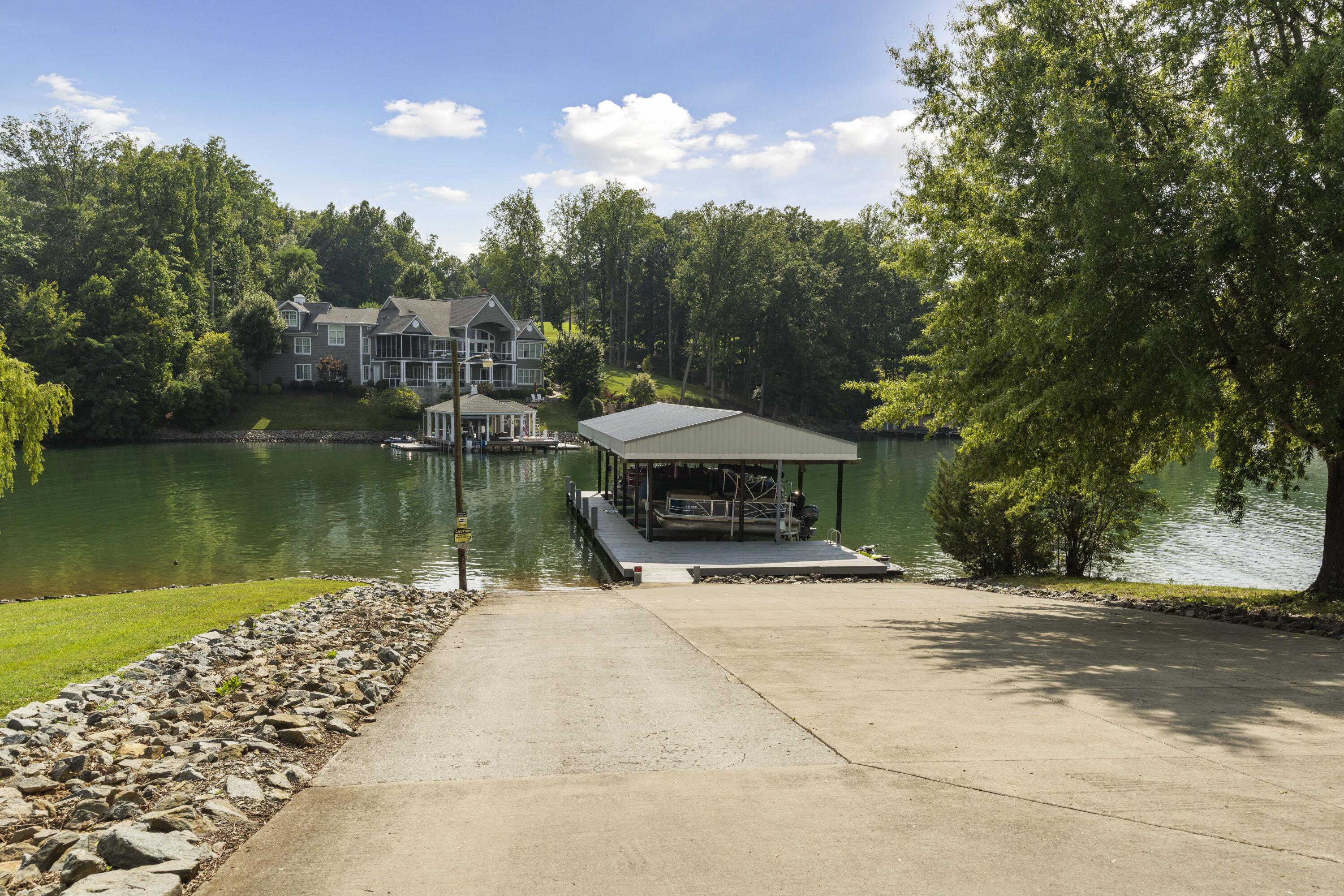 391 Cool Branch Road Penhook, VA 24137 - Photo 14 of 54 a view of a house with pool and sitting area