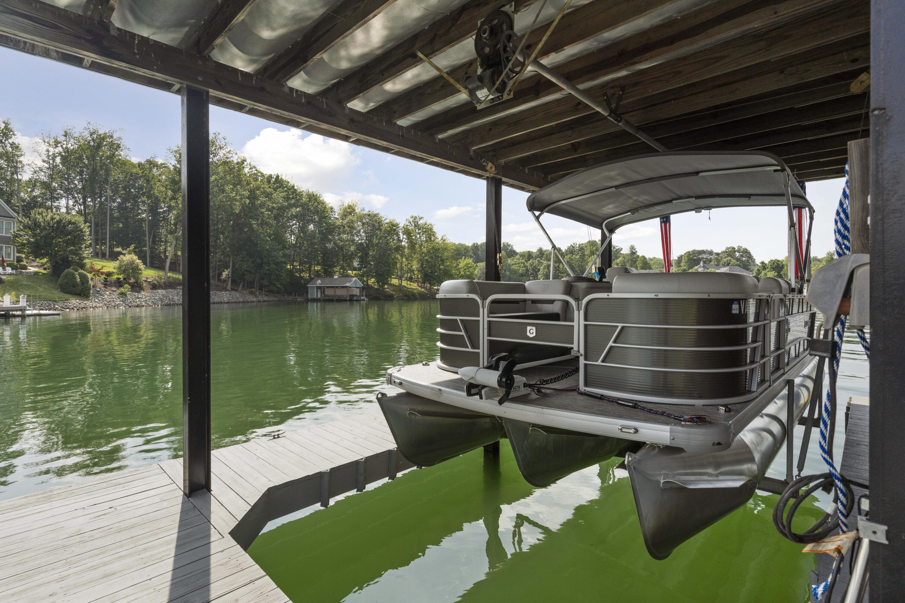 391 Cool Branch Road Penhook, VA 24137 - Photo 15 of 54 a view of a swimming pool with a patio