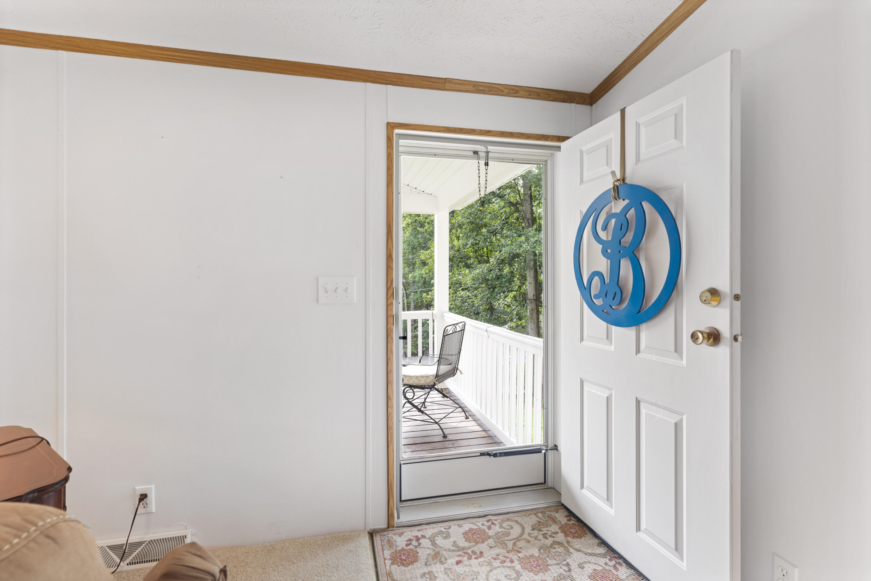 391 Cool Branch Road Penhook, VA 24137 - Photo 19 of 54 a view of a hallway with painted walls