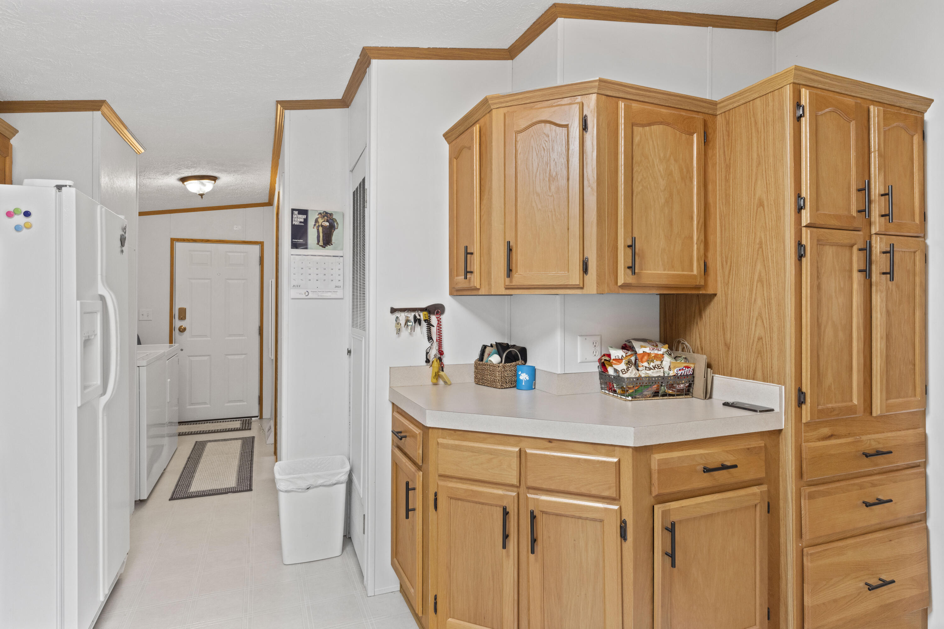 391 Cool Branch Road Penhook, VA 24137 - Photo 36 of 54 a kitchen with stainless steel appliances granite countertop a refrigerator and cabinets