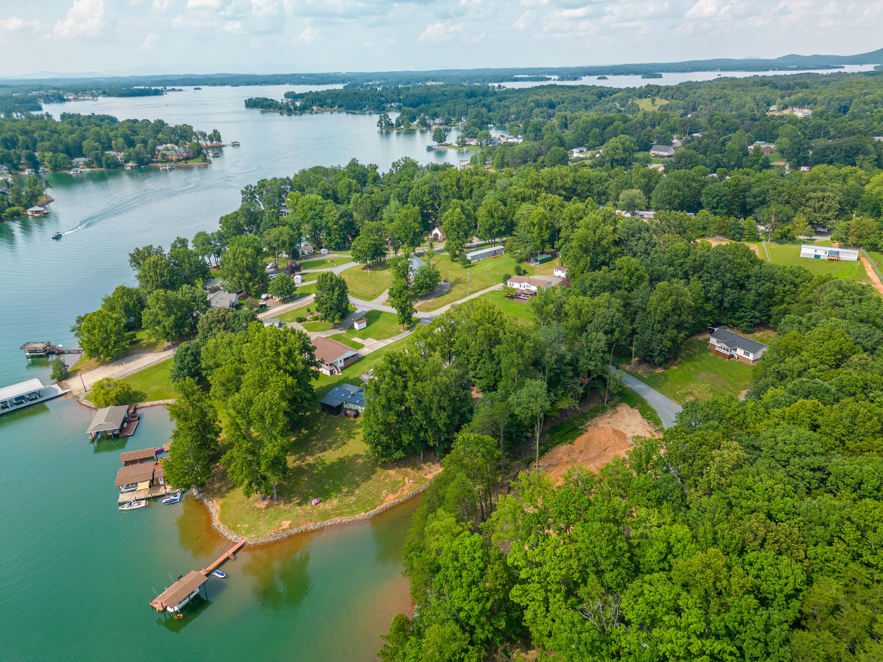 391 Cool Branch Road Penhook, VA 24137 - Photo 50 of 54 a view of a lake with a city