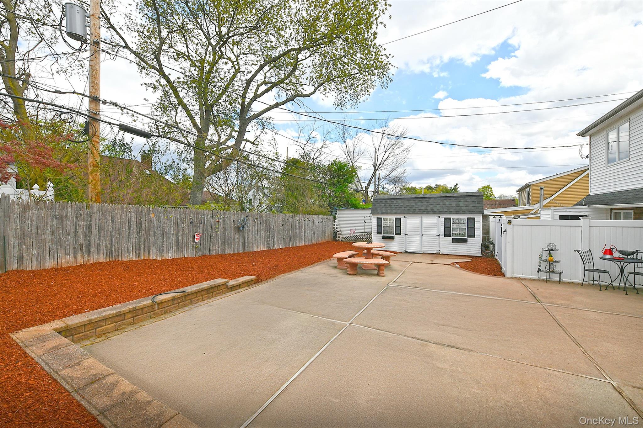 156 Farmedge Road Levittown, NY 11756 - Photo 20 of 22 a view of outdoor space with swimming pool