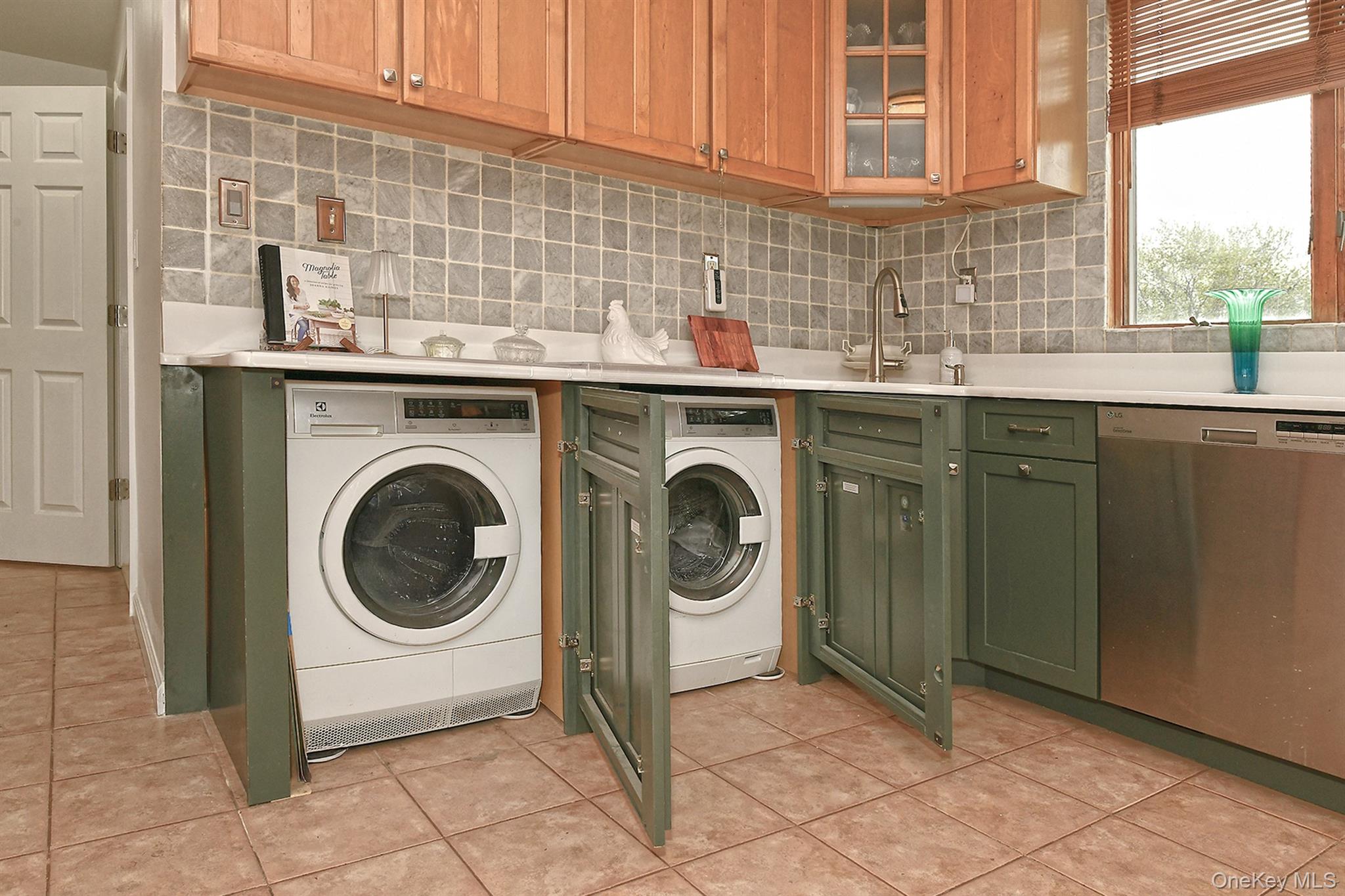 156 Farmedge Road Levittown, NY 11756 - Photo 9 of 22 a utility room with sink dryer and washer