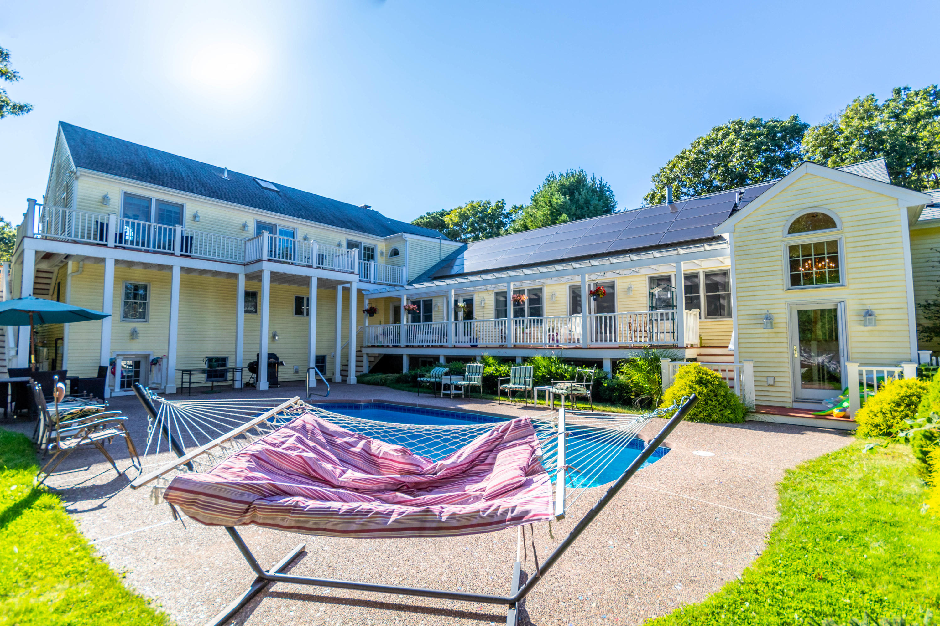 52 Lovells Road Cotuit, MA 02635 - Photo 3 of 51 a view of house with outdoor seating