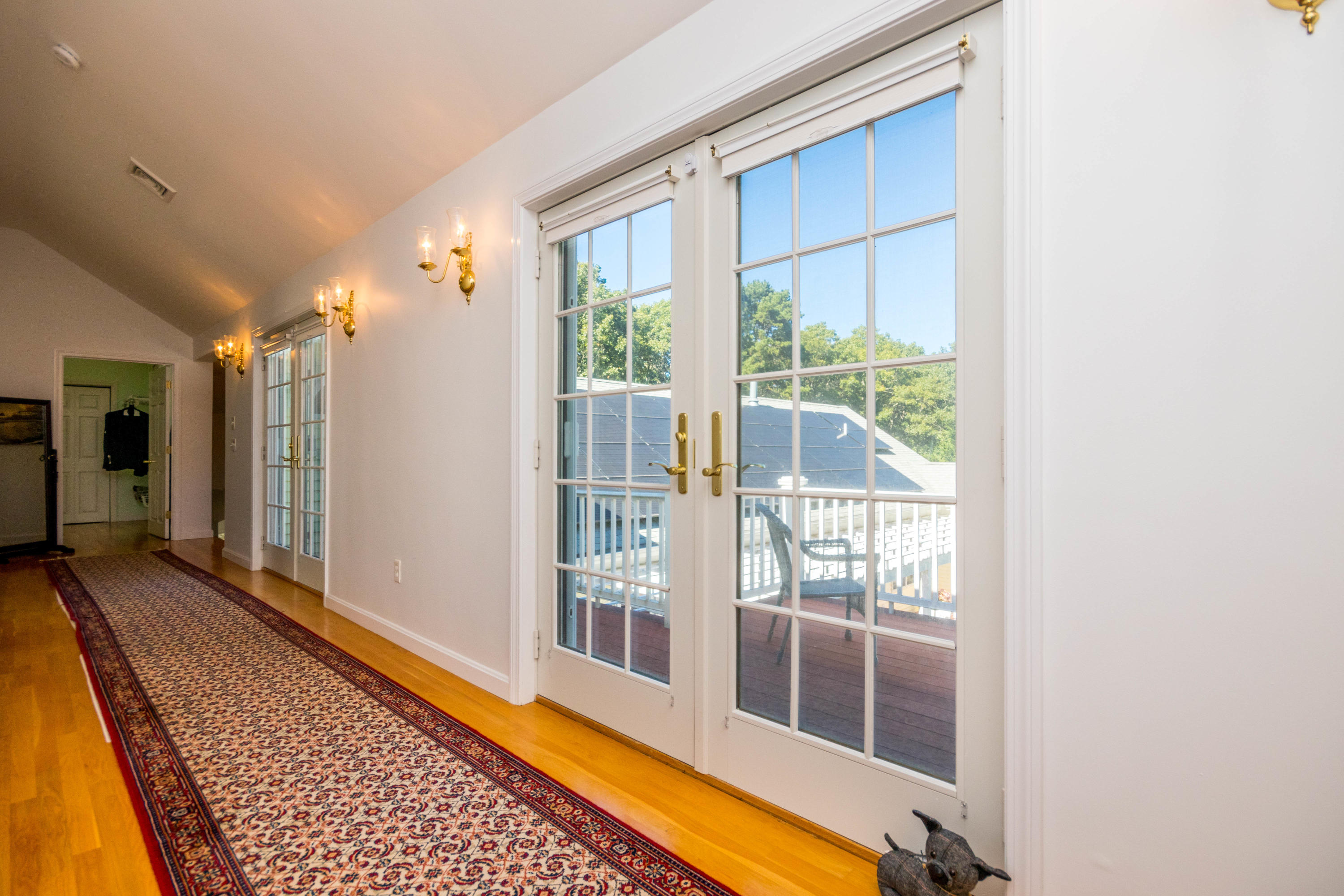 52 Lovells Road Cotuit, MA 02635 - Photo 31 of 51 a view of a room with wooden floor