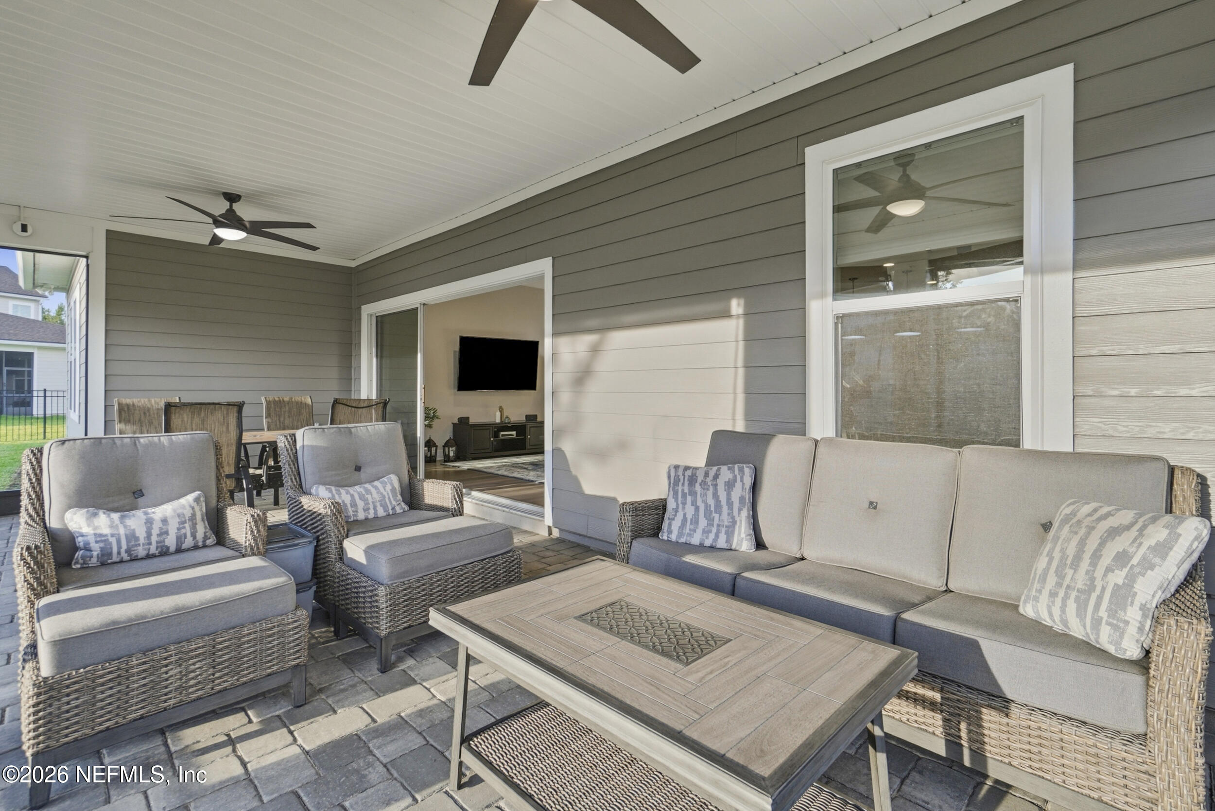 34 Red Rock Lane St. Johns, FL 32259 - Photo 49 of 71 a living room with furniture and a large window