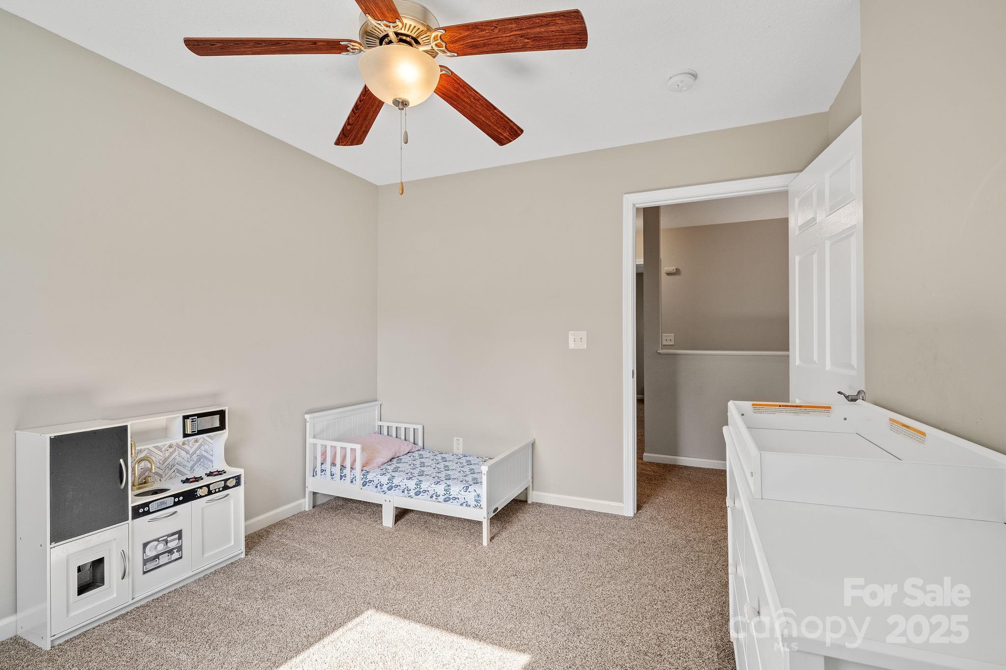 33 English Ivy Road Asheville, NC 28806 - Photo 19 of 27 a living room with furniture and a flat screen tv