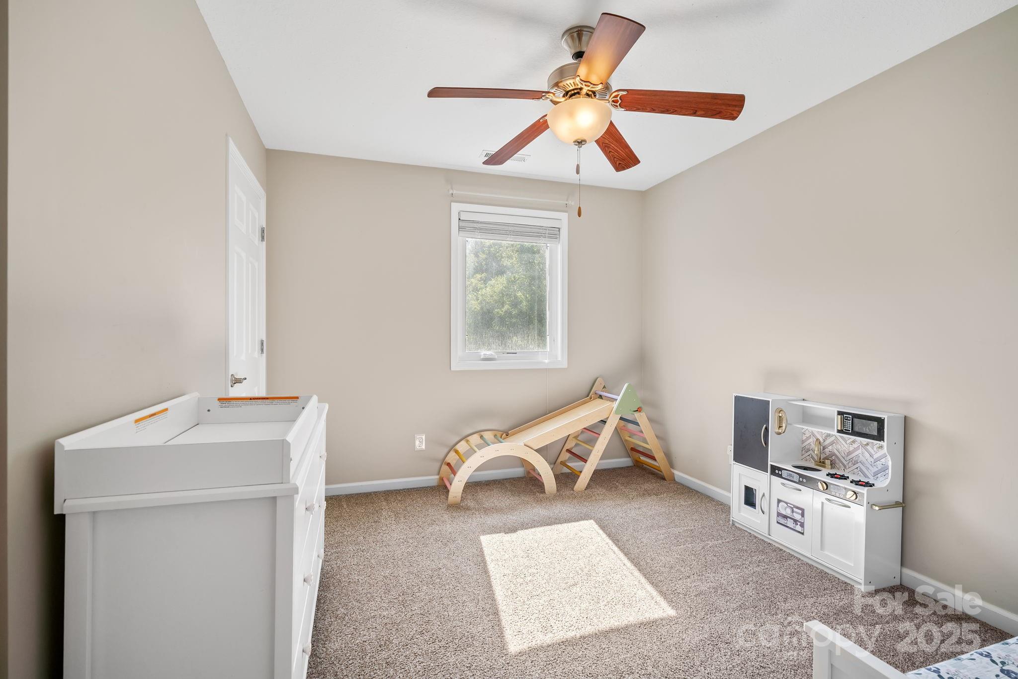 33 English Ivy Road Asheville, NC 28806 - Photo 20 of 27 a living room with furniture and a table