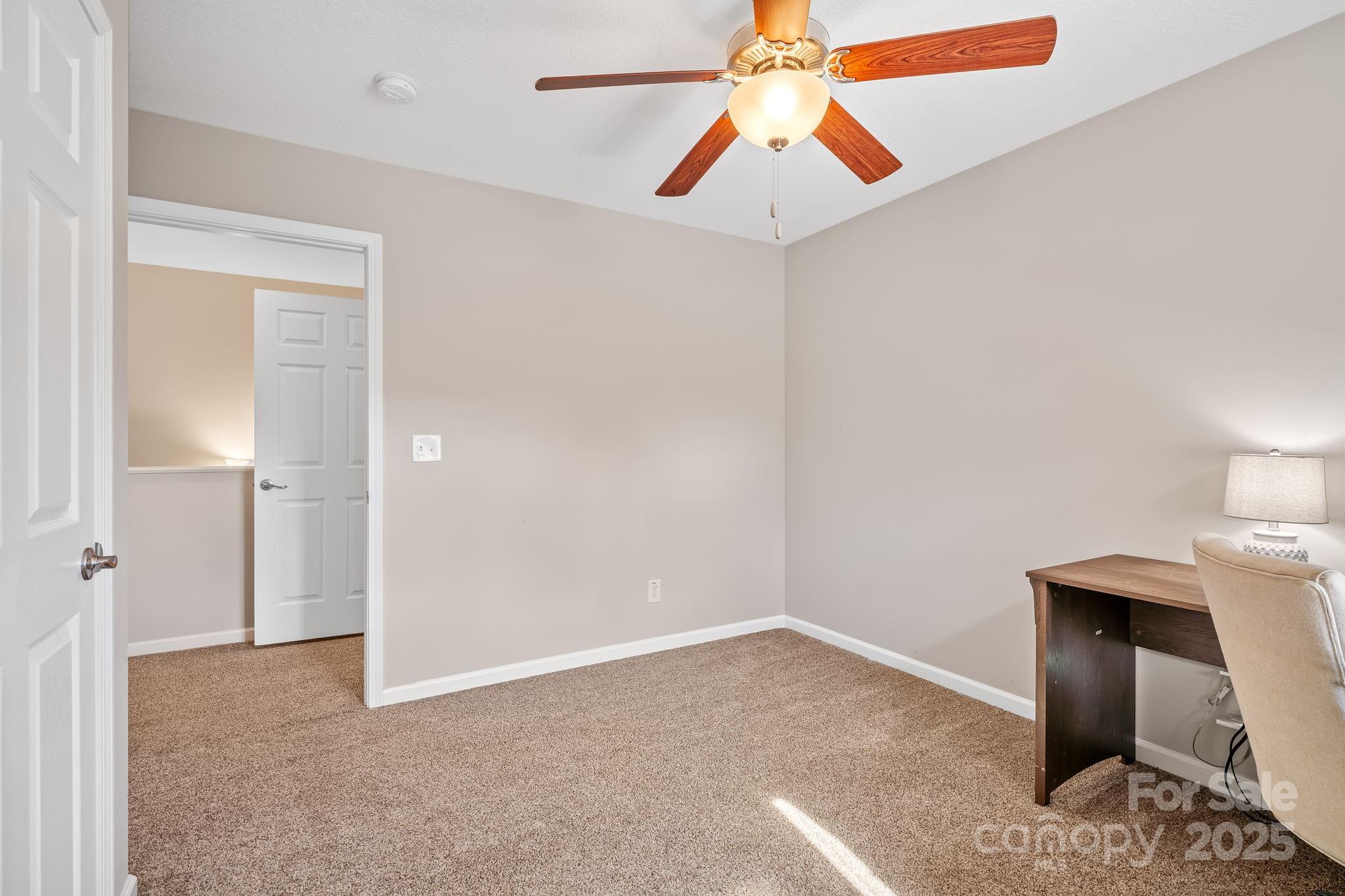 33 English Ivy Road Asheville, NC 28806 - Photo 23 of 27 a view of an empty room and chandelier fan