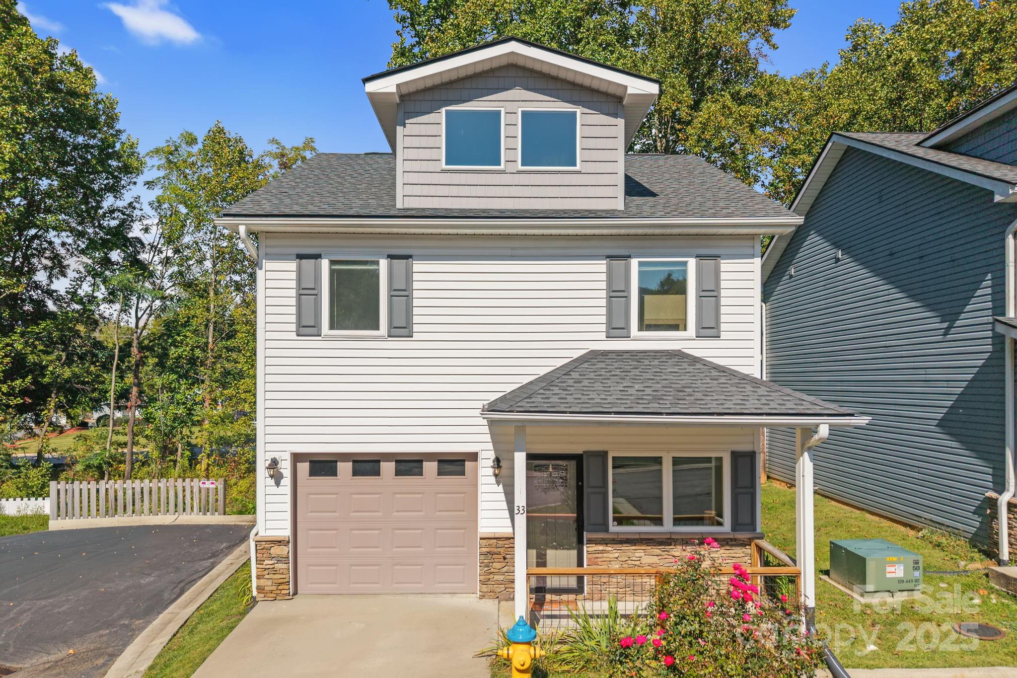 33 English Ivy Road Asheville, NC 28806 - Photo 26 of 27 a front view of a house with a yard
